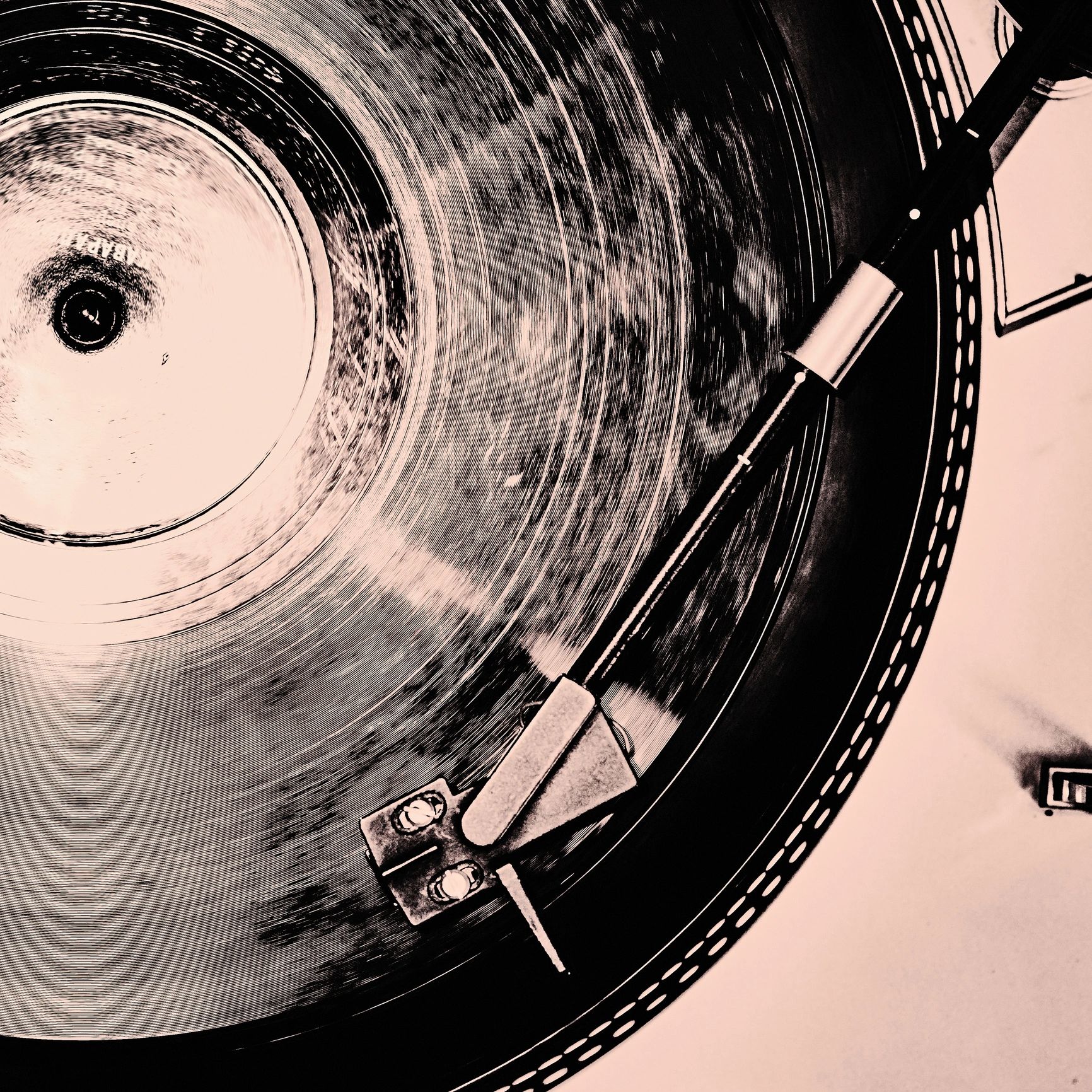 Spinning vinyl record on turntable