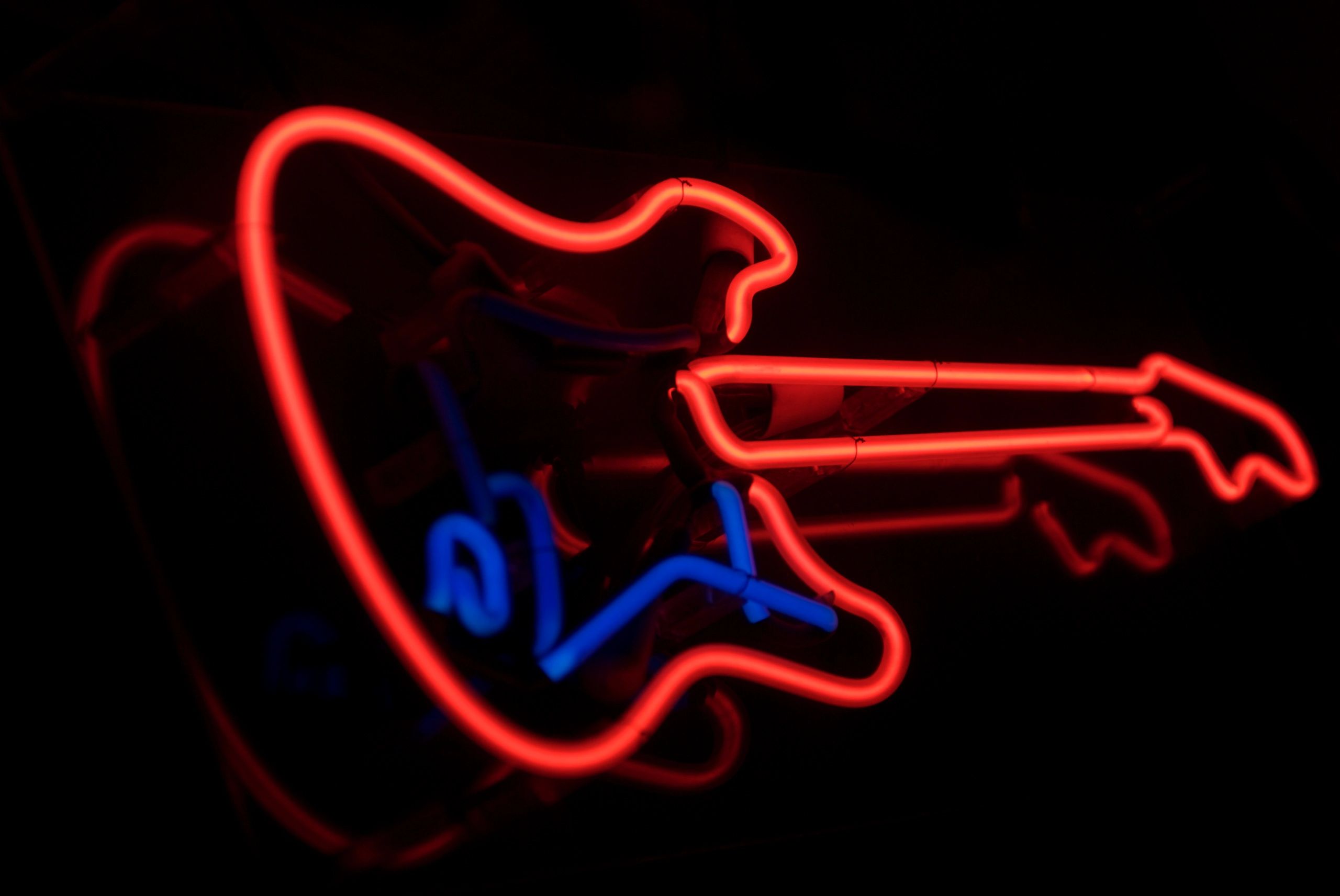 Electric guitar in red and blue neon