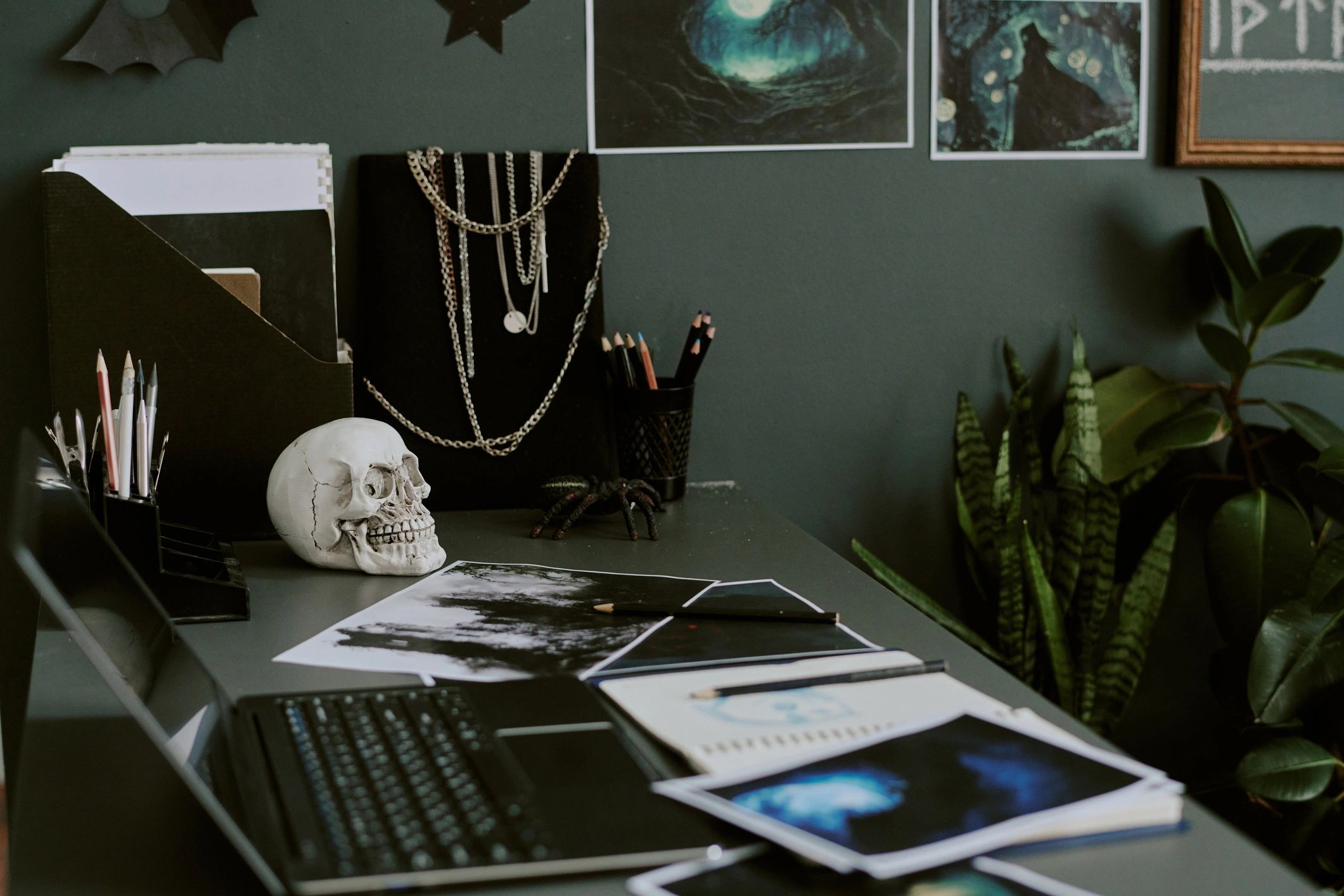 Sketches and laptop on a designer table